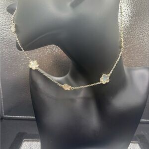 Elegant Gold and White Clover Necklace